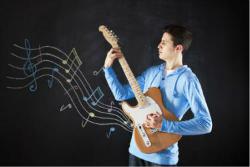 guitarist playing music